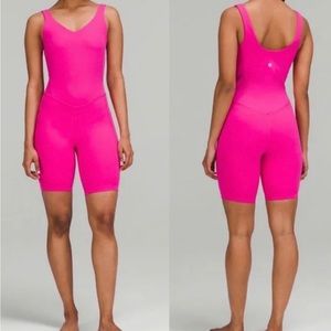 NEVER WORN SONIC PINK BODY SUIT